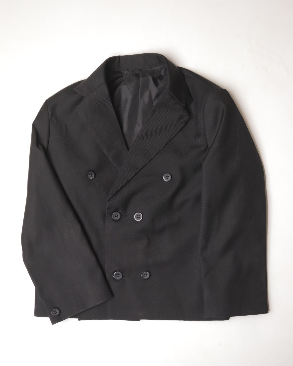 BLACK BLAZER WITH DIAGONAL BUTTONS