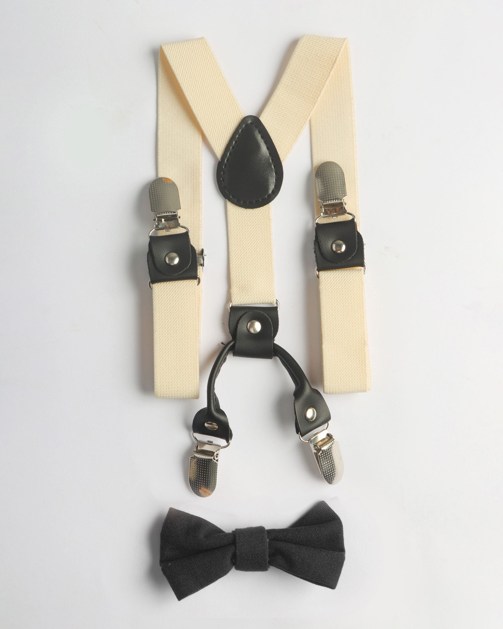 IVORY SUSPENDER WITH BLACK BOW TIE