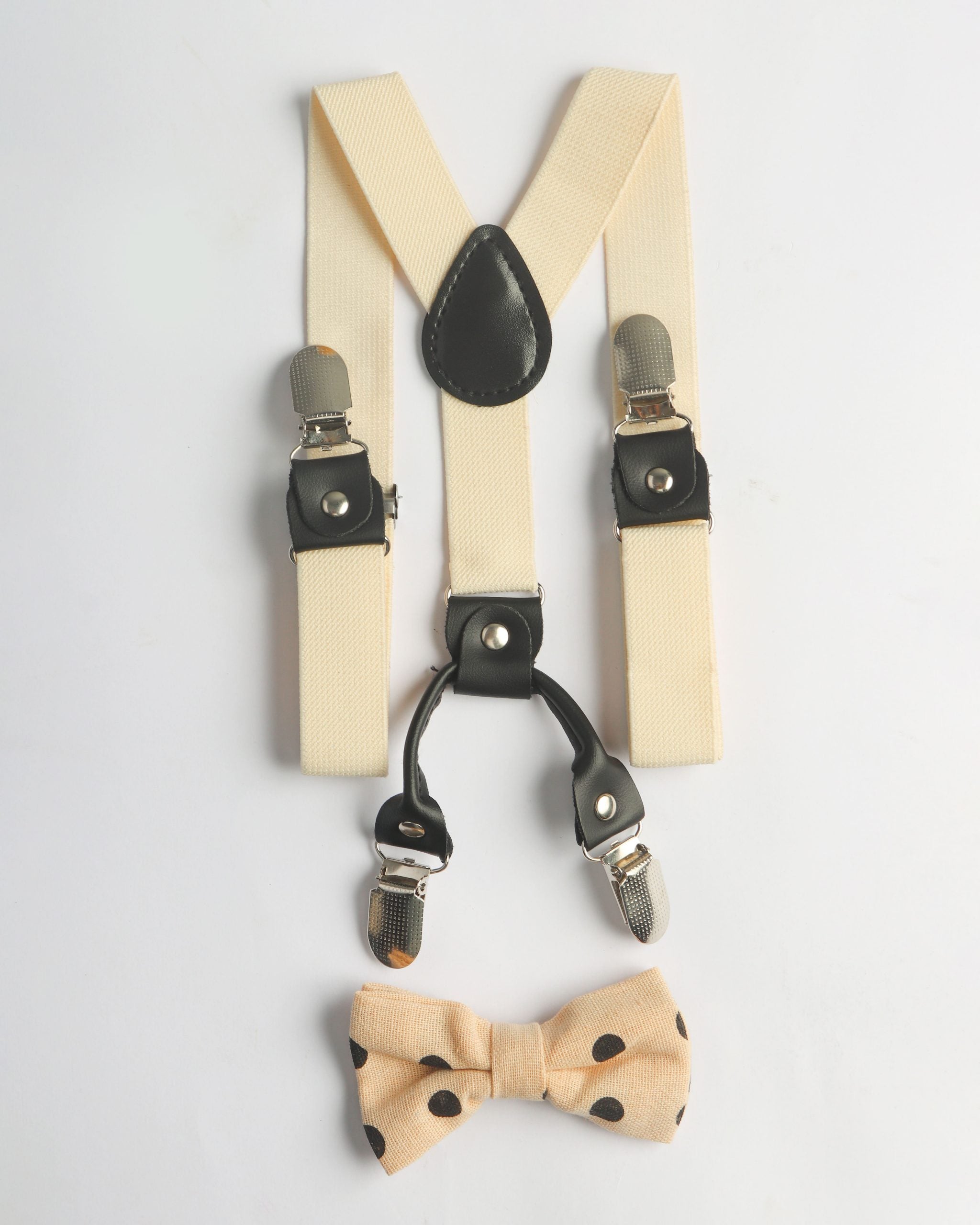 IVORY SUSPENDER WITH BLACK DOTTED BOW