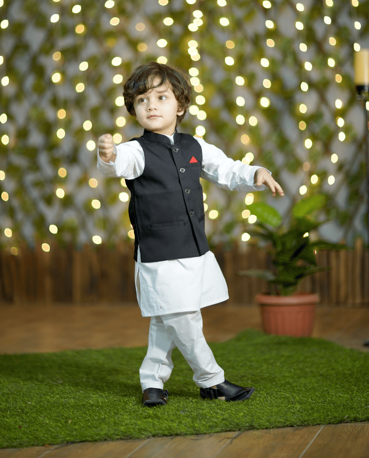 White kurta pajama with black waistcoat hotsell